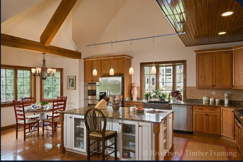 kitchen with island in a timber frame home