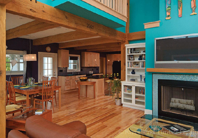 timber frame home interior with vibrant turquoise walls