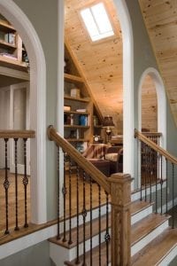 Loft nook perfect for a library with built-in shelving