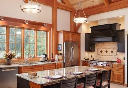 paducah-kitchen-island.jpg - timber frame kitchen with black stove vent