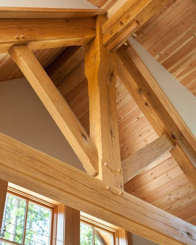 timber framed support with exposed mortise and tenons